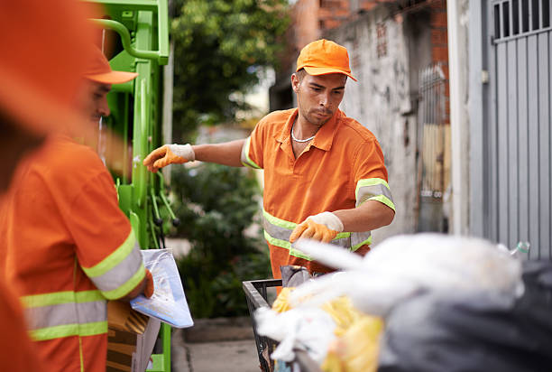 Cropped shot of a garbage collection team at work
